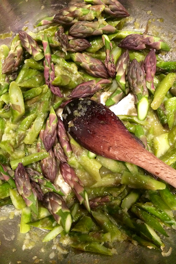 Asparagus cooking before being tossed with pasta.