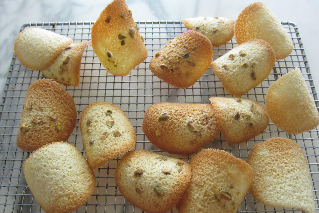 Delicate, crisp tuiles can be made from the same recipe as financiers. Credit: Copyright 2015 Martha Rose Shulman