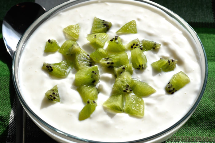 Coconut cream topped with kiwi. 